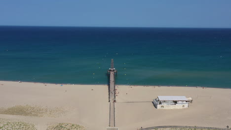 Sandy-beach-Leucate-ponton-mediterranean-coast-seaside-resort-France-sunny-day